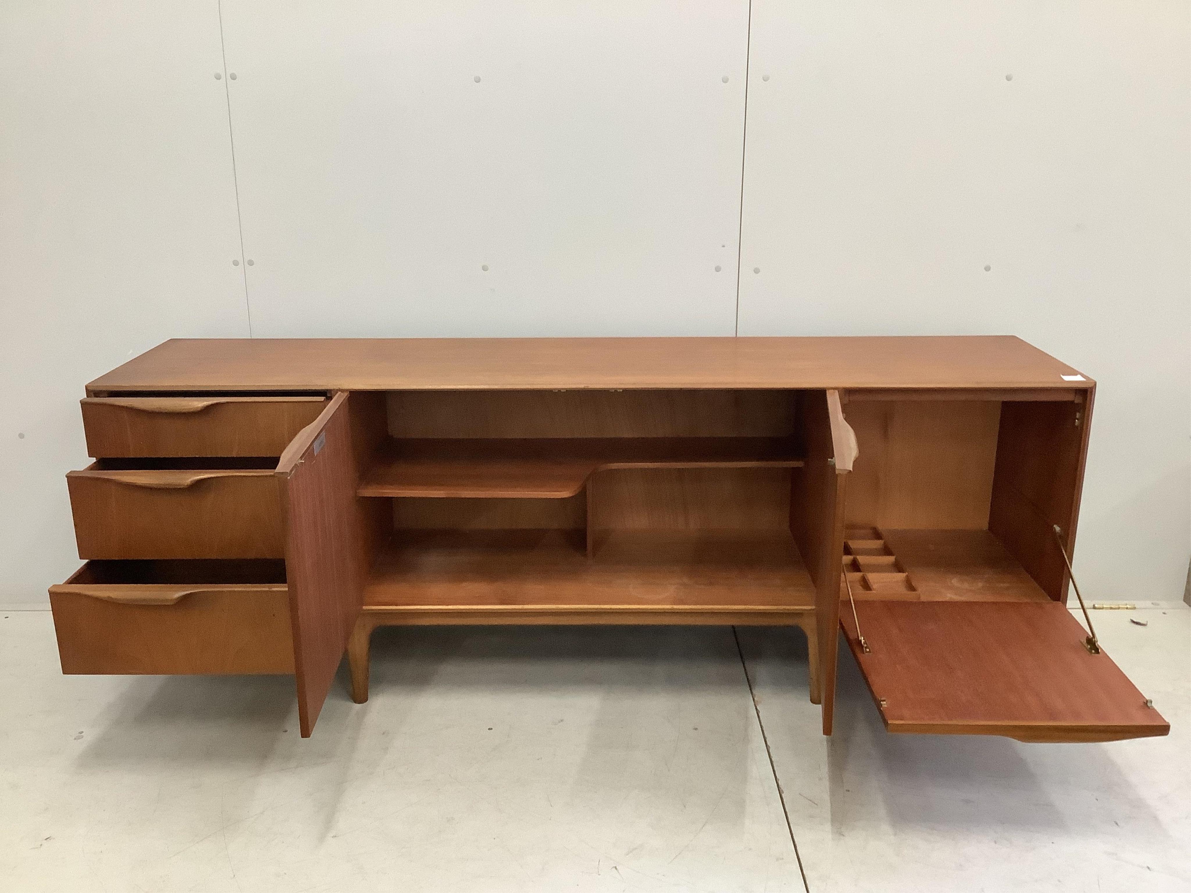 A mid century teak sideboard by A. Macintosh and Co., width 202cm, depth 47cm, height 74cm